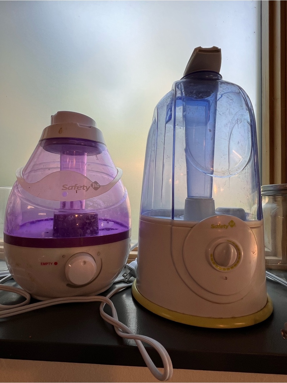 Two Safety 1st Twin Baby Humidifiers in Purple and Blue